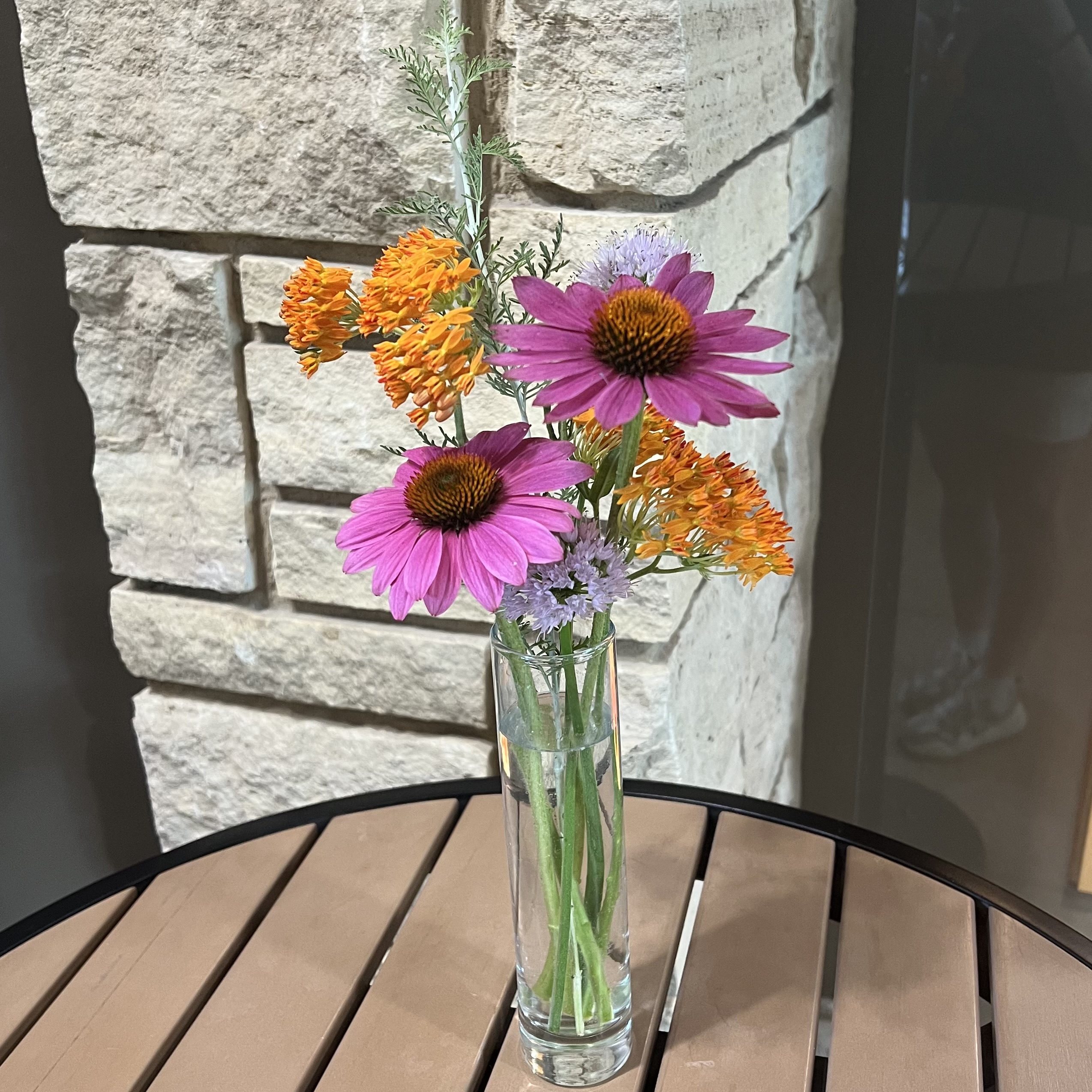 a bouquet of colorful flowers that attract pollinators
