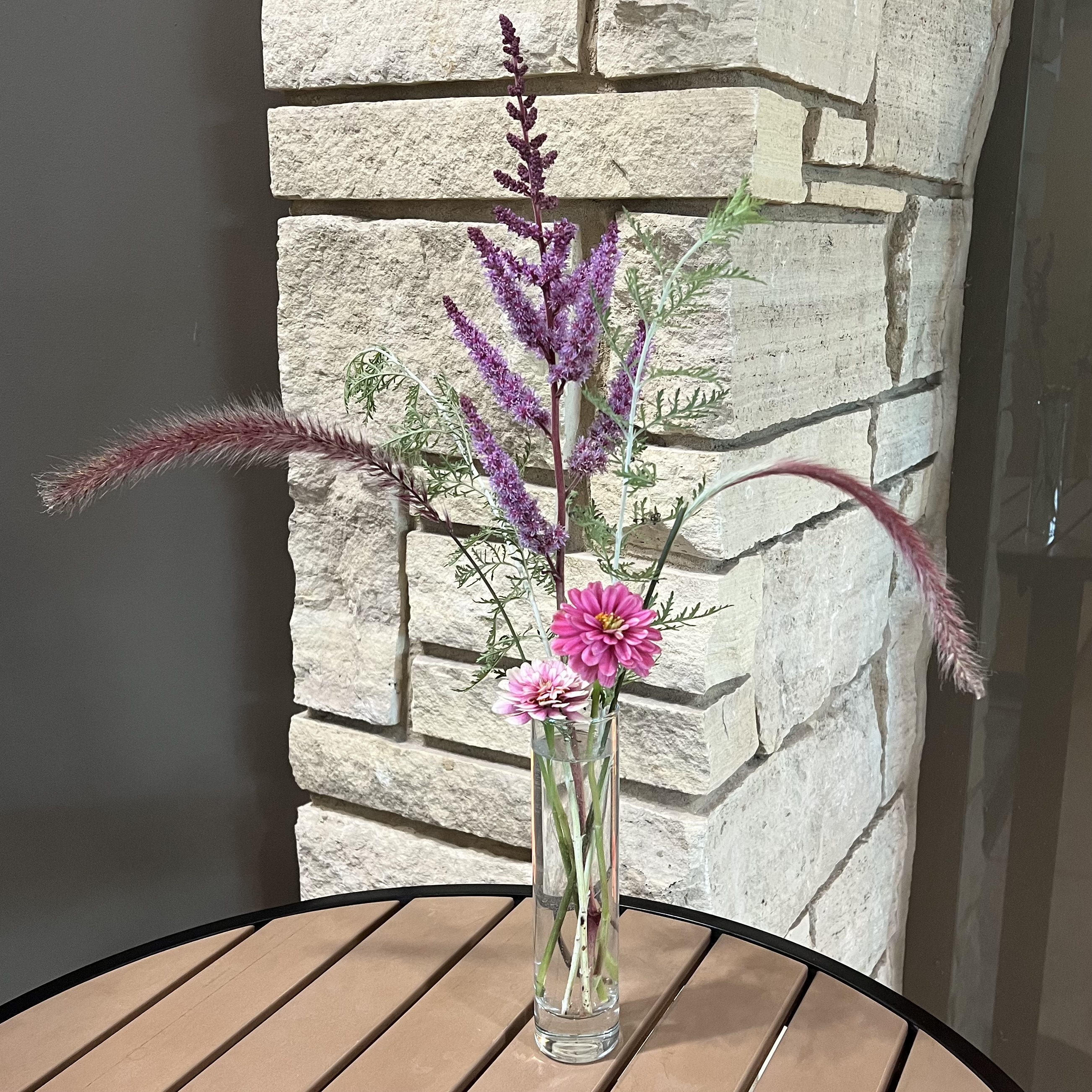 A bouquet with deep purple foliage/flowers